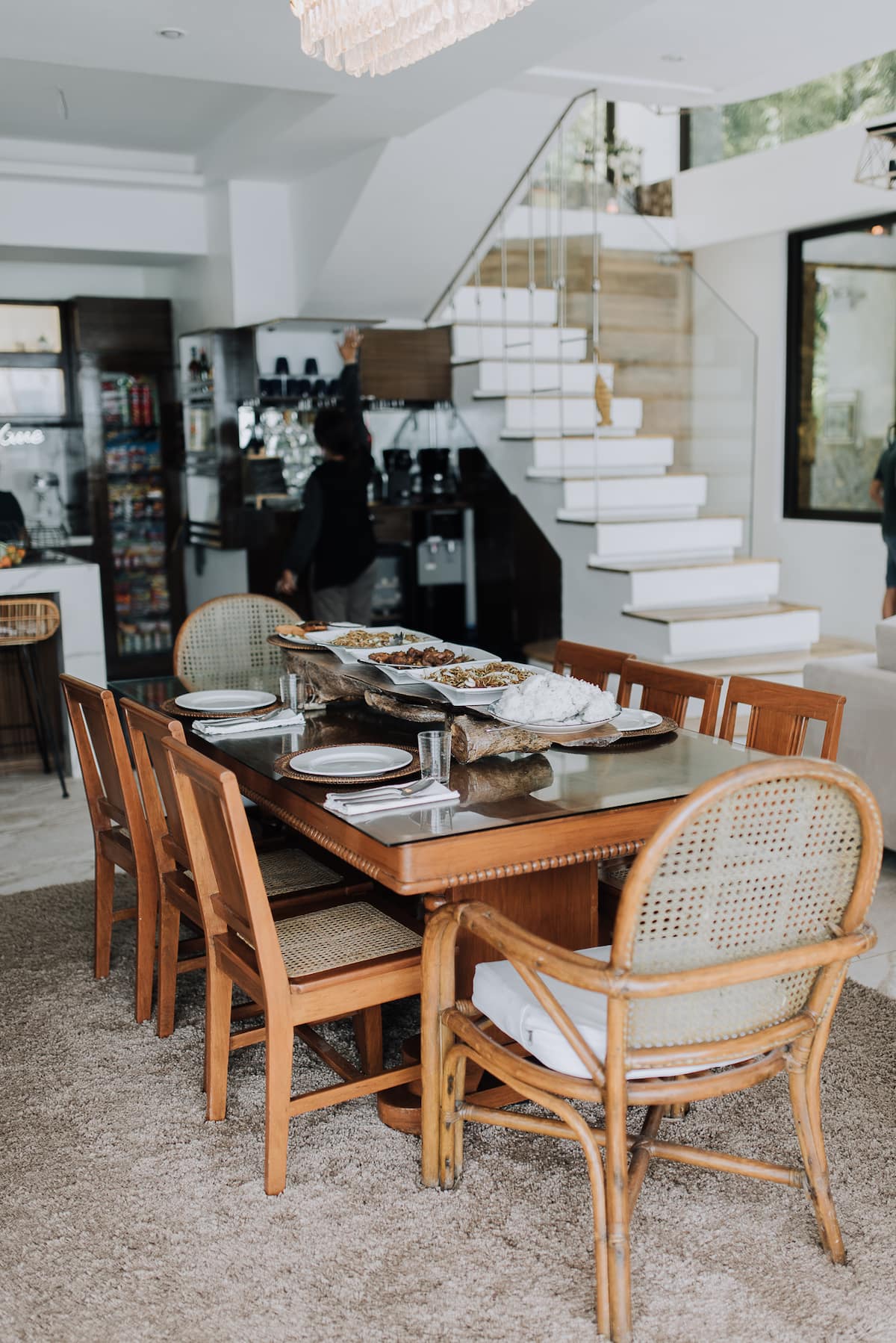 A long family table laid for a Filipino feast at G Boutique Resort, Santander